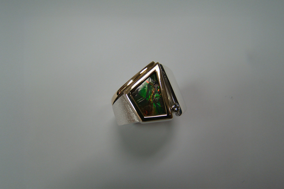 Bezel Set Ammolite in a White and Yellow Gold Band with a Bezel Set Diamond Ring