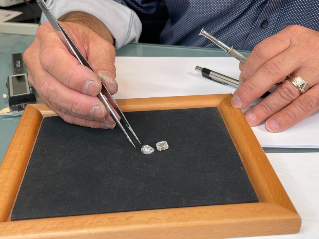 Goldsmith doing gemstones matching