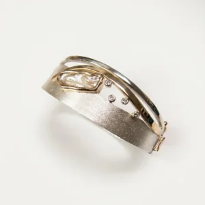 Brushed White Gold Bangle with Mother of Pearl and Bezel Set Diamonds​